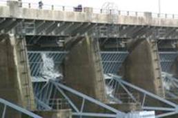 Water going over the top of the flood gates at Table Rock Dam