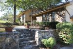 The two tier home has been remodeled and well maintained located in Branson North Subdivision. 