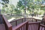 Multi-level deck overlooking the yard.