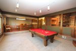 This is lower tier of the family room and pool table.  Pool table will be left at buyers option