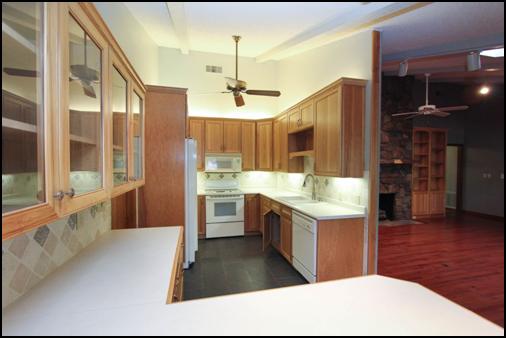 Kitchen and Breakfast Bar adjacent to dining area