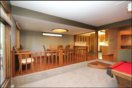 Dining area on upper level adjacent to kitchen
