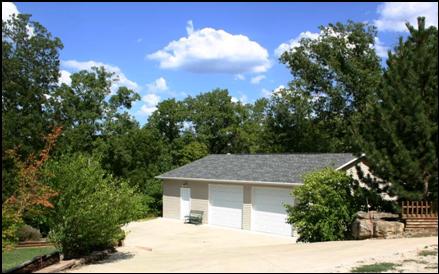 Unattached garage next to home.