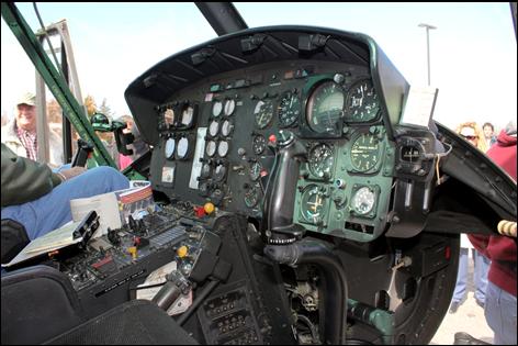 With permission, visitors were allowed to sit inside the Huey.